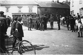 Territorials line up outside the venerable old shop in 1909