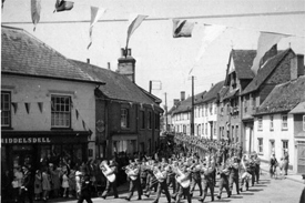 The Wings for Victory Parade in 1943 when the building was a sweet shop